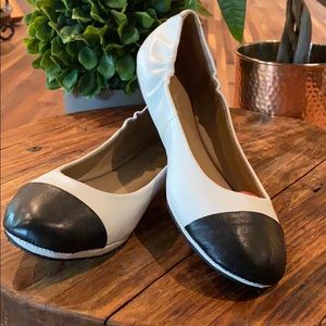 White and Black Leather Flats. Brand new!